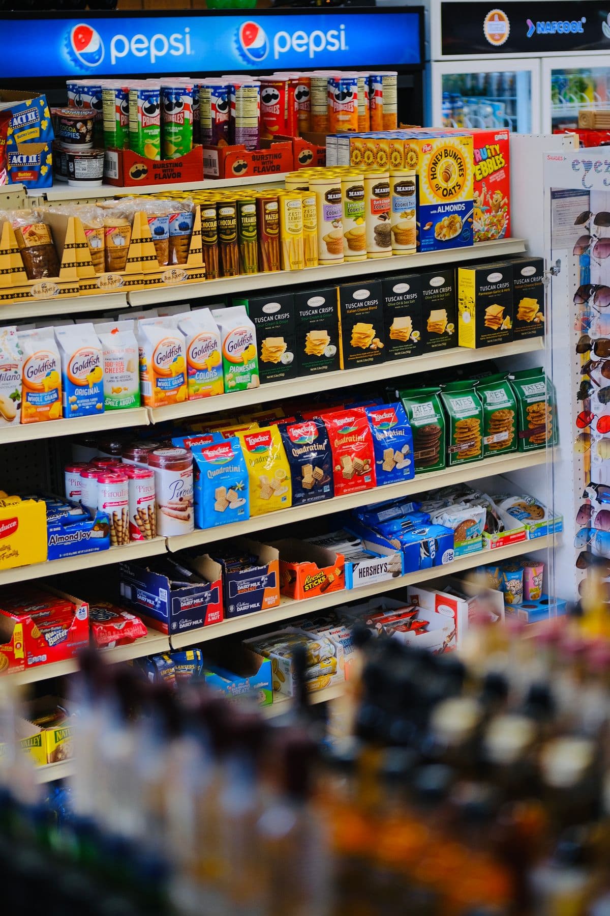 Retail shelves with a wide variety of packaged goods representing a product portfolio